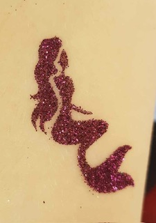 Pink mermaid glitter tattoo